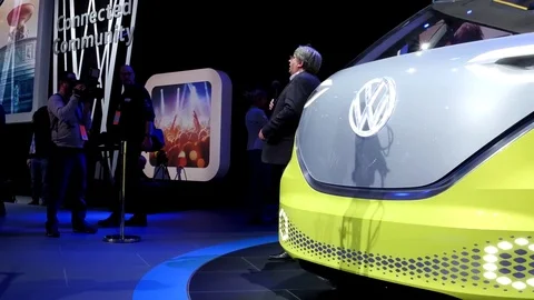 Pan across autonomous self-driving Volkswagen van at Detroit Auto Show Stock Footage 71560966