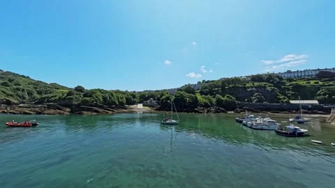 Pan across the bay in the outer harbour in the seaside town of Ilfracombe Stock-Footage 281425758