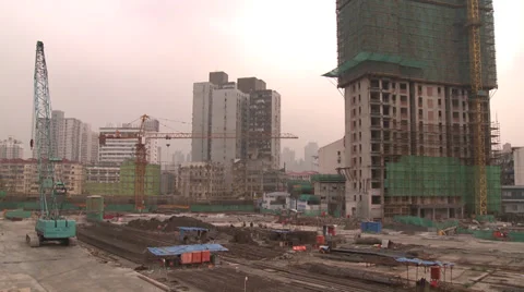 Pan across big construction site, central Shanghai Stock Footage 38172662