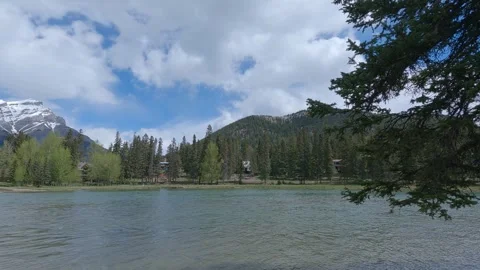 Pan across Bow River Banff National Park on a spring day. Canada. 4K Stock Footage 305320522