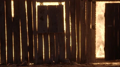 Pan Across burning Cabin Stock Footage 165330443