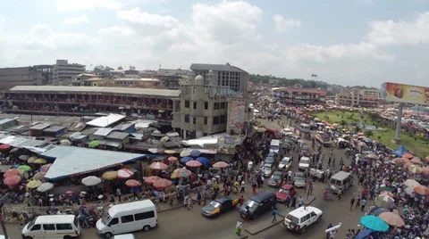 Pan across busy Kumasi Market in Ghana Stock Footage