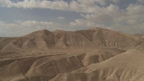 Pan across canyons and mountains of Negev desert Stock Footage 86759899