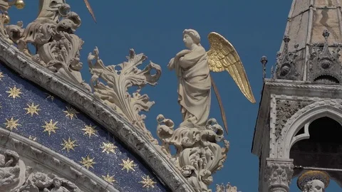 Pan across Close up detail of the Gothic architecture to the Lion of St Marks Stock Footage 83290039