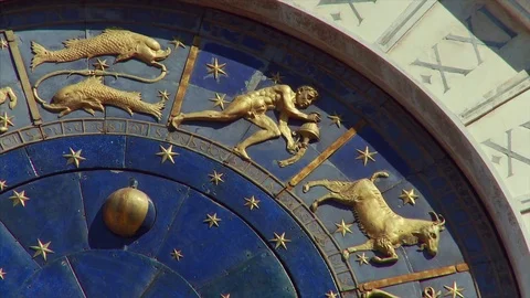 Pan across close up of St Mark's Clock Tower, Venice, Veneto, Italy Stock Footage 74339382