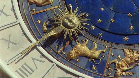 Pan across close up of St Mark's Clock Tower, Venice, Veneto, Italy Stock Footage 74339788