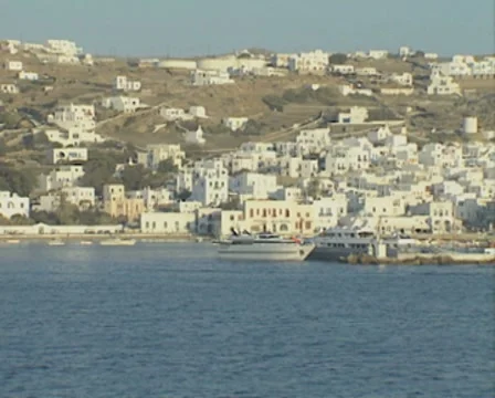 Pan across coastal buildings Stock Footage