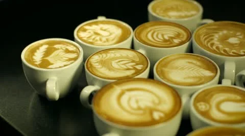 Pan across coffee cups Stock Footage 22255593