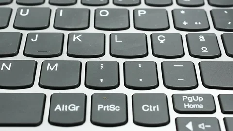 Pan Across Computer Keyboard as Background Stock Footage 336610449