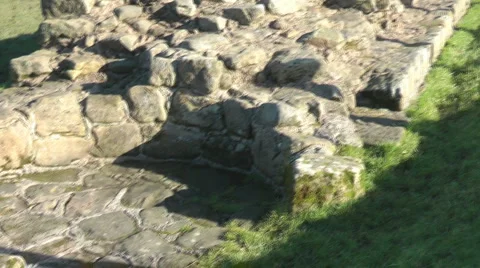 Pan across consolidated section of Hadrian's Wall, World Heritage Site. Stock Footage 1089264