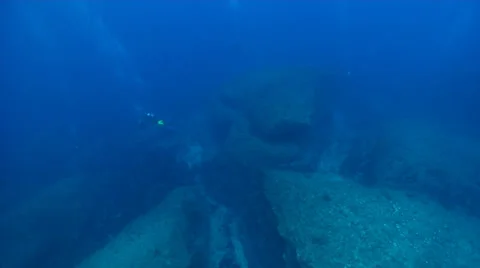Pan across deep coral reef in Moreton Bay, Queensland, Australia, with distant Stock Footage 38296418