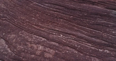 Pan across detailed wall texture in the desert Stock Footage 93723800