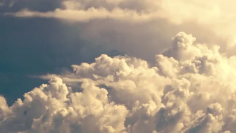 Pan Across Dynamic High Contrast Cumulus Clouds with Deep Dark Shadows with Stock Footage 345089246