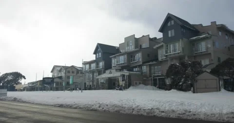 Pan Across Empty Road and Ski Resort During Covid 19 Shutdown Stock Footage 137851620