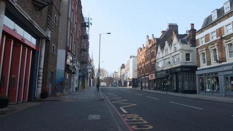 Pan across empty streets of Angel in London during Lockdown Stock Footage 127854554