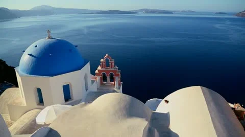 Pan across Greek Orthodox church on the Greek island of Santorini. Stock Footage 19389960