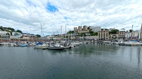 Pan across the harbour and seafront in Torquay on the English Riviera 스톡 동영상 281497481