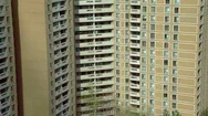 Pan Across Highrise Building With Balconies Stock Footage
