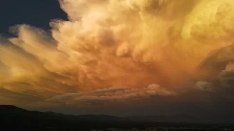 Pan across huge storm and crazy big clouds - 4k drone aerial Stock Footage 220584318