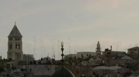 Pan across Jerusalem Old Town at sunset. Stock Footage 10985632