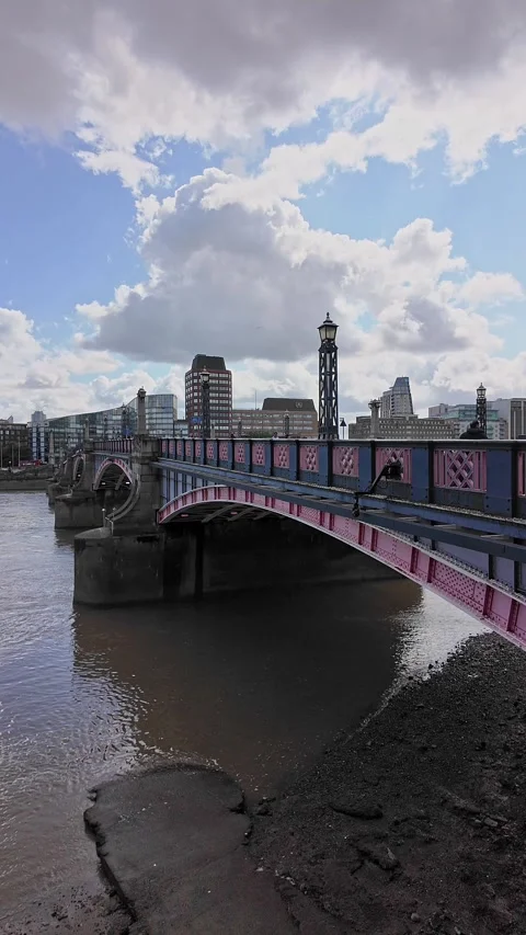 Pan across Lambeth Bridge and the River Thames in the city of London Stock-Footage 283295438