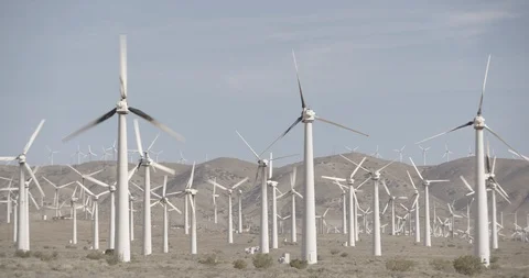 Pan Across Large Windmill Farm in California Desert Stock Footage 89942461