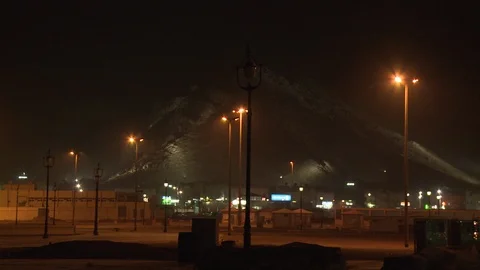 Pan across Mount Uhud in Mina, Saudi Arabia, Night Stock Footage 86760282