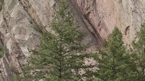 Pan across mountain detail in Eldorado Canyon outside Boulder Colorado Stock Footage 76411633