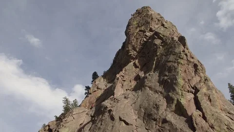 Pan across mountain peak at Eldorado Canyon Boulder Colorado 库存影片 76413170