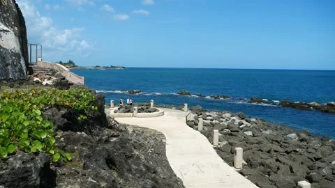 Pan across oceanfront walkway at El Morro Castle. Stock Footage 178600295