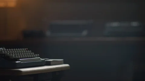 Pan across an old vintage typewriter in an office Stock Footage 97871079
