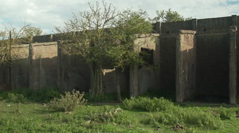 Pan across old WW2 barracks Stock Footage 53844435