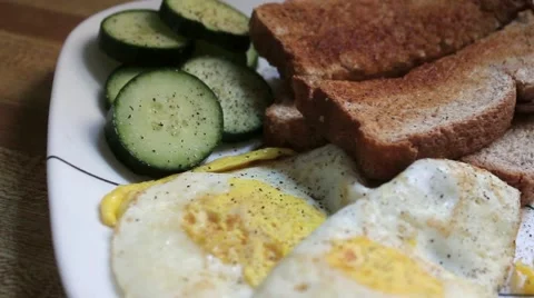 Pan Across Plated Breakfast Stock Footage 64973100