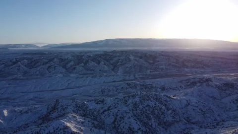 Pan across Pryor Mountain range early winter Stock Footage 310574529