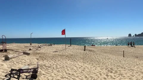 Pan Across Quiet Beach with Ocean View and Distant Arch in Los Cabos–Dec 2023 Stock Footage 313971965