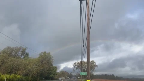 PAN ACROSS RAINBOW OVER VINEYARD Stock Footage 274096617