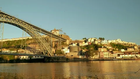 Pan across the River Douro to the Ponte Luis bridge Stock Footage 120514273