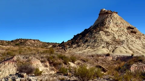 Pan across rock formations - Bardenas Riales Natural Park, Navarre, Spain Stock Footage 74600413
