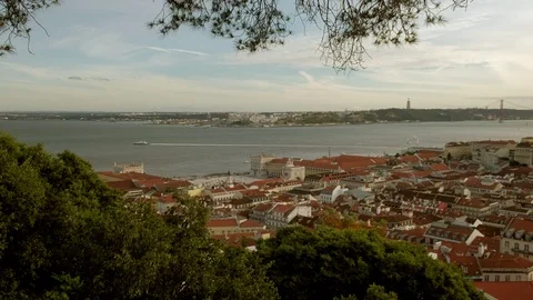 Pan across the rooftops of central Lisbon Stock Footage 119056522