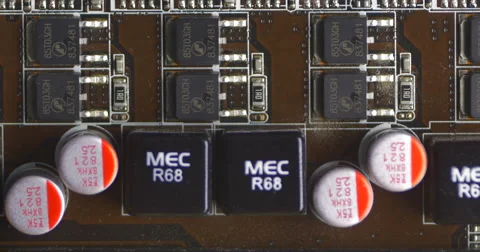 Pan across rows of circuits and nodes attached to a motherboard Stock Footage 61724800