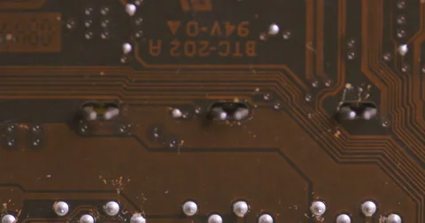 Pan across rows of circuits attached to a motherboard Stock Footage 61724689