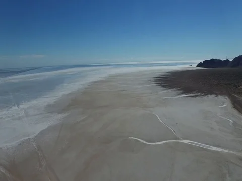 Pan across salt flats near the delta of the Colorado River in Mexico Stock Footage