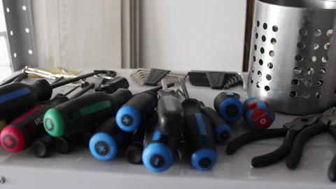 Pan Across Screwdrivers and Tools Stock Footage 237722527