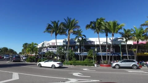 Pan across a section of St. Armands Circle Stock Footage 60754481