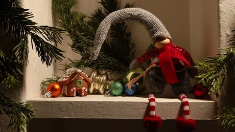 Pan across shelf with sitting elf Stock Footage 258994149