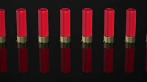 Pan Across Shotgun Shell Line Stock Footage 58931547