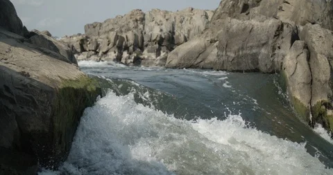 Pan across slow motion waterfall in Great Falls Park Stock Footage 91897729
