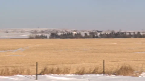 Pan across snowy fracking operation site Stock Footage 47940428