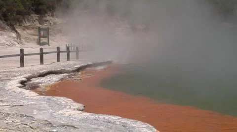 Pan across steaming hot pool Stock Footage 4905190