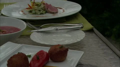 Pan across table of food Stock Footage 22665012